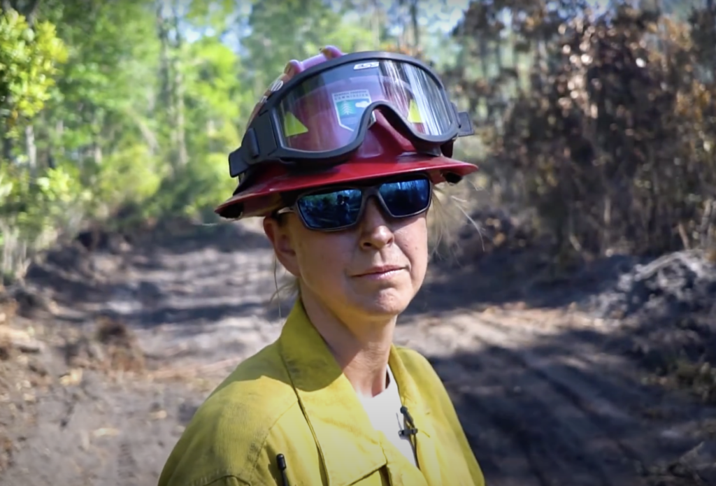 female wildland firefighter in PPE