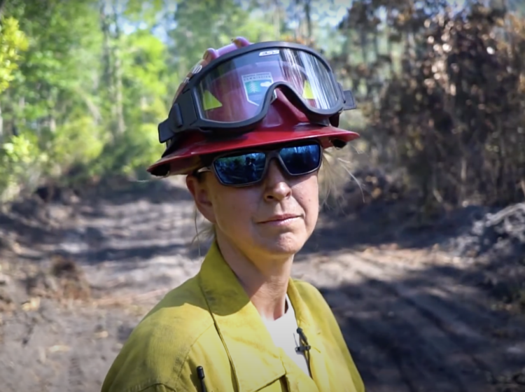 female wildland firefighter in PPE
